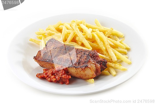 Image of Grilled pork meat and french fries