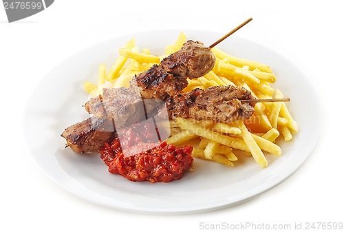 Image of french fries and grilled kebab meat