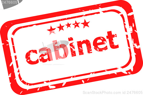 Image of cabinet on red rubber stamp over a white background