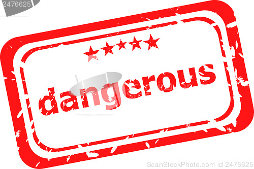Image of dangerous word on red rubber old business stamp