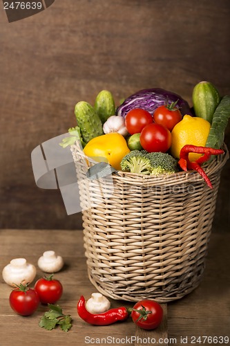 Image of Healthy Organic Vegetables on a Wooden Background