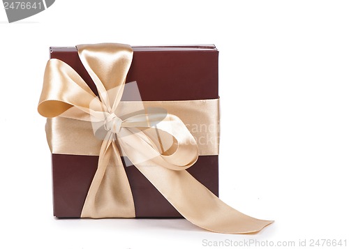 Image of Box with candies and golden tape