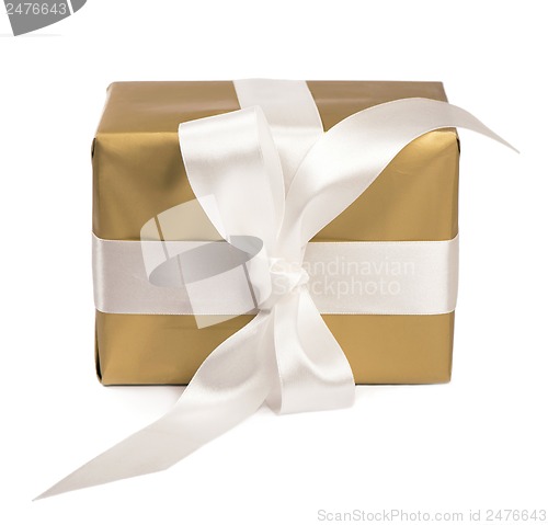 Image of gift packed into golden box with White Ribbon