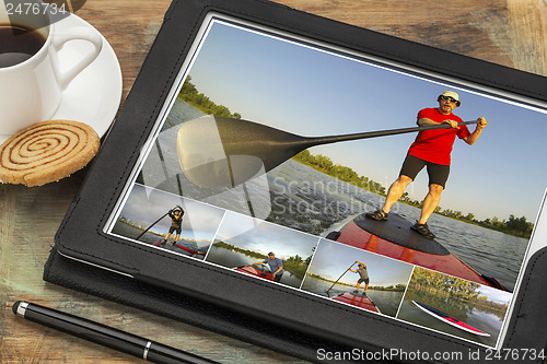 Image of stand up paddling on digital tablet
