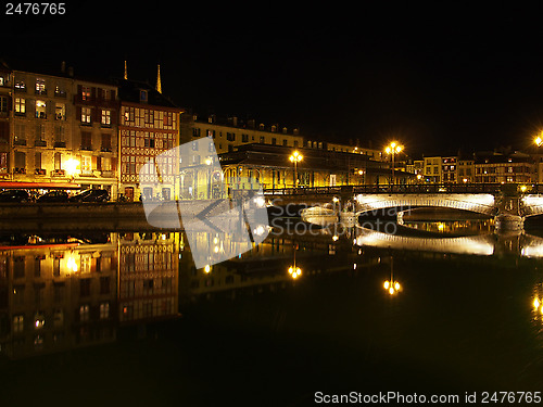 Image of Bayonne, Nive riverside at night, France