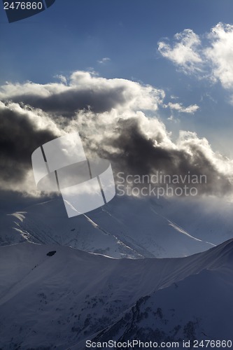 Image of Evening mountain and sunlight clouds