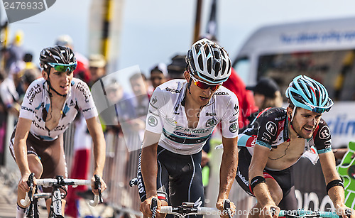 Image of  The Cyclist Michal Kwiatkowski Wearing the White Jersey