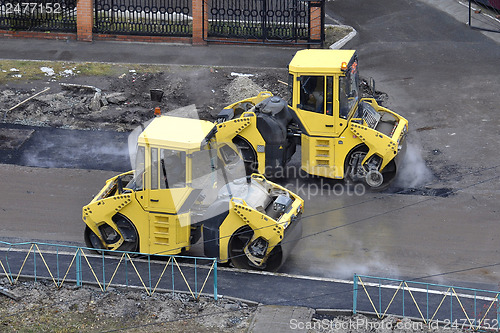 Image of Special equipment on road repair. Skating rink.