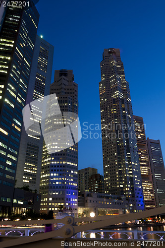 Image of Singapore downtown skyscrapers at evening