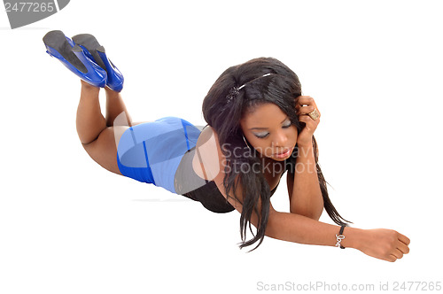 Image of Girl lying on floor.