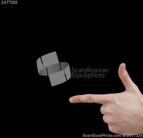 Image of White hand on black