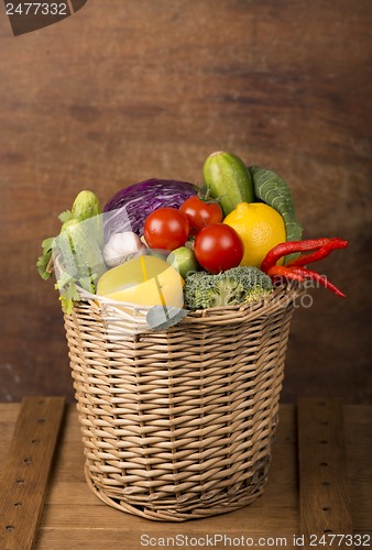 Image of Healthy Organic Vegetables on a Wooden Background