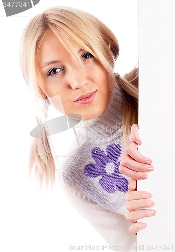 Image of Woman beside whiteboard