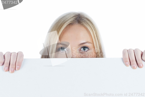 Image of Woman beside whiteboard