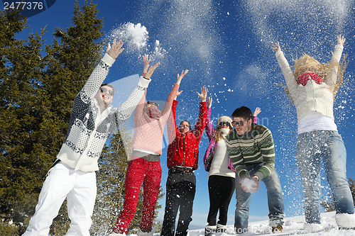 Image of winter fun with young people group