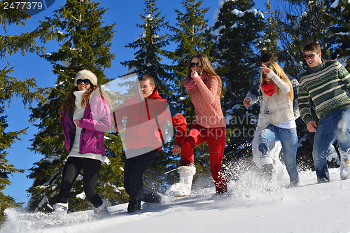 Image of winter fun with young people group