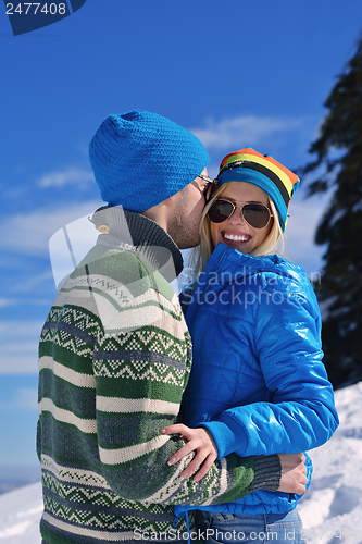 Image of Young Couple In Winter  Snow Scene