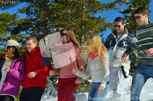Image of winter fun with young people group
