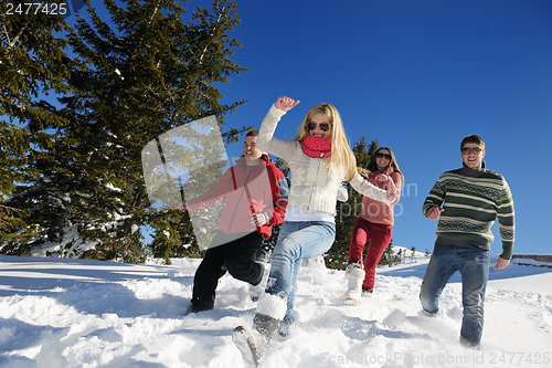 Image of winter fun with young people group