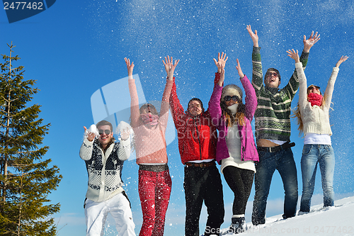 Image of winter fun with young people group