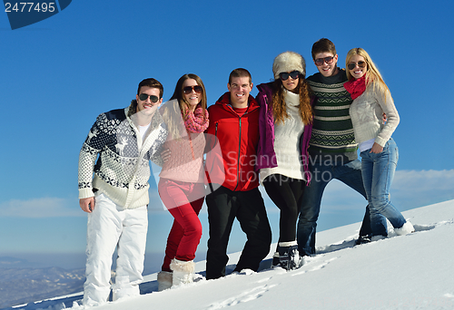 Image of winter fun with young people group
