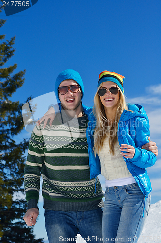 Image of Young Couple In Winter  Snow Scene