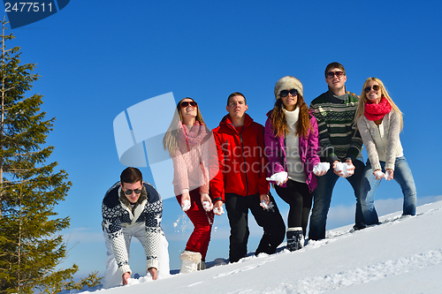 Image of winter fun with young people group