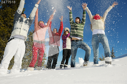 Image of winter fun with young people group