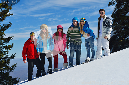 Image of winter fun with young people group