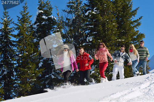 Image of winter fun with young people group