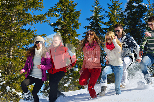 Image of winter fun with young people group