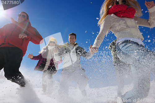 Image of winter fun with young people group