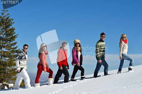 Image of winter fun with young people group