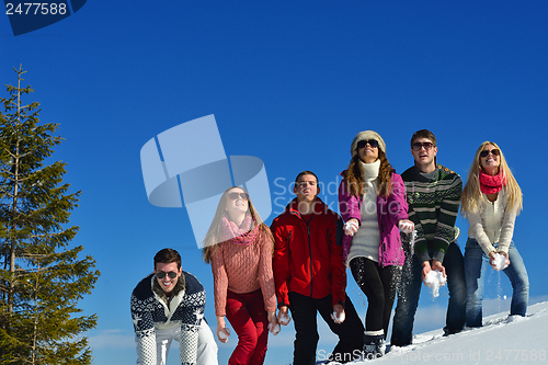 Image of winter fun with young people group