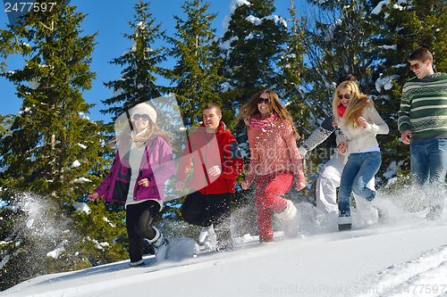 Image of winter fun with young people group