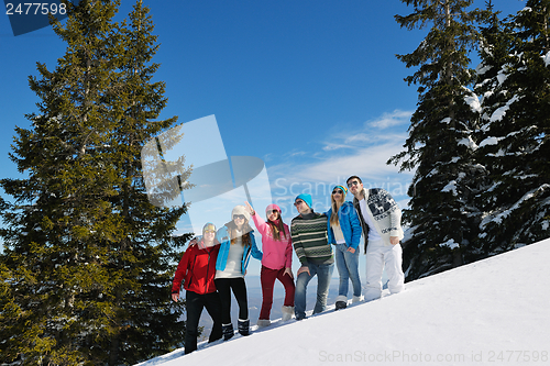 Image of winter fun with young people group