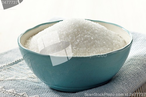 Image of white sugar in a bowl