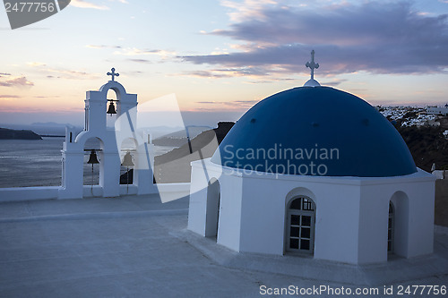 Image of Sunset in Santorini church (Firostefani)