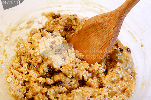 Image of Mixing oatmeal raisin cookie dough