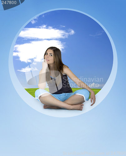 Image of Beautiful Athletic woman relaxing in a window