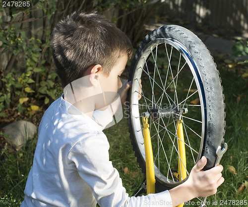 Image of Kid who fix bikes