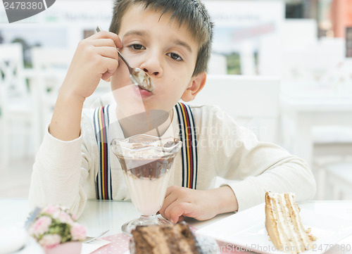 Image of Child eat milk choco shake