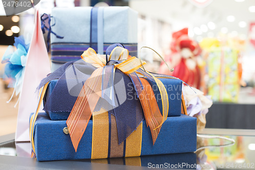Image of Blue Gift boxes in shopping center