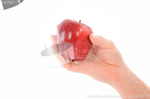 Image of A Hand Holding a Red Apple on White