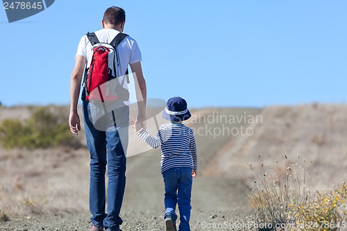 Image of family hiking