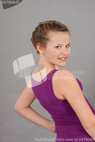 Image of young teenager girl smiling having fun