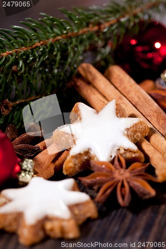 Image of fresh tasty christmas cinnamon cookies and sticks decoration 