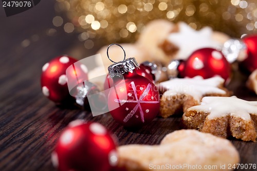 Image of fresh tasty christmas cinnamon cookies and sticks decoration 