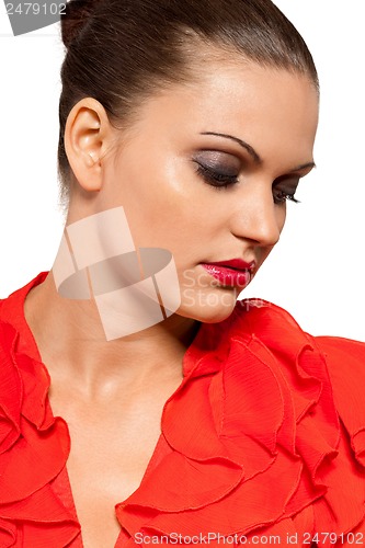 Image of beautiful young woman with perfect skin and red lips makeup