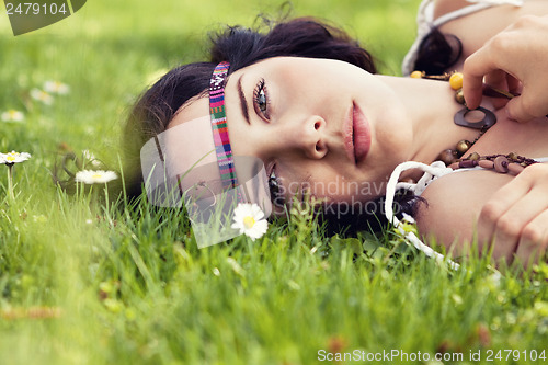 Image of beautiful dreamy woman in summer